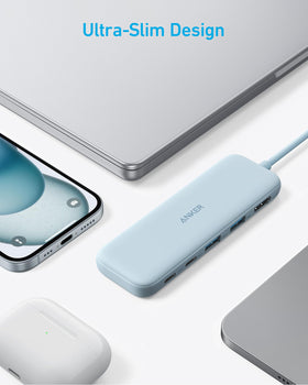 Anker USB C Hub in a work setup with laptop and accessories