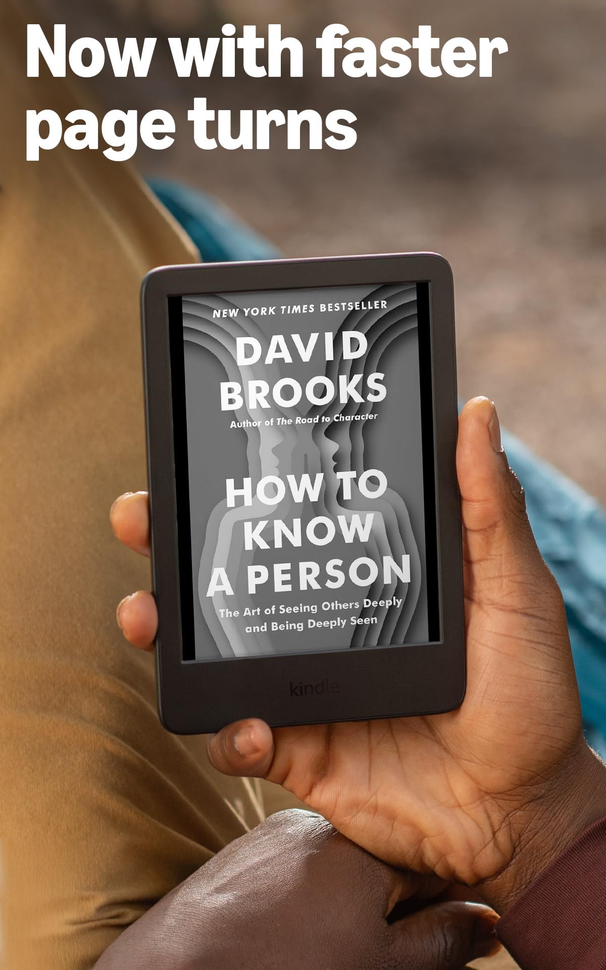 Compact design of Amazon Kindle with library of books