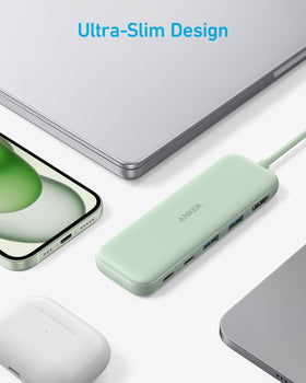 Anker USB C Hub next to a MacBook Pro for seamless connectivity